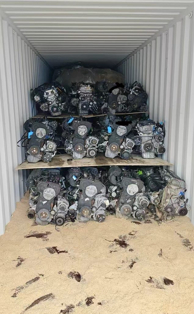 Engine batches inside a shipping container